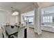 Dining room with view to the kitchen and living area at 112 Calder Dr, Alpharetta, GA 30009