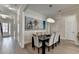 Dining area with modern light fixture, and artistic wall decor at 112 Calder Dr, Alpharetta, GA 30009