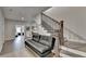 Hallway with hardwood floors, wooden stair rails, and a view of a bedroom at 112 Calder Dr, Alpharetta, GA 30009