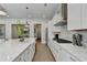 Open concept kitchen with an island and stainless steel appliances at 112 Calder Dr, Alpharetta, GA 30009