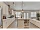 Spacious kitchen with stainless steel appliances and hardwood floors at 112 Calder Dr, Alpharetta, GA 30009