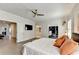 A spacious main bedroom featuring hardwood floors, ceiling fan, and multiple doorways at 112 Calder Dr, Alpharetta, GA 30009