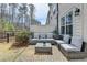 Outdoor patio with cushioned seating area ideal for relaxing and entertaining guests at 112 Calder Dr, Alpharetta, GA 30009