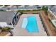 Community swimming pool with a sun deck and lounge area, perfect for relaxing and enjoying the outdoors at 112 Calder Dr, Alpharetta, GA 30009