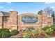 Attractive Berkeley Hills Estates community sign surrounded by colorful landscaping and brickwork at 2471 Arnold Palmer Way, Duluth, GA 30096