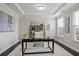 Bright home office with tray ceiling, natural light, and modern decor at 2471 Arnold Palmer Way, Duluth, GA 30096