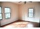 This bedroom is bright with natural light and hardwood floors at 2642 Joyce Ave, Decatur, GA 30032