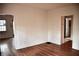 Living room with hardwood floors, neutral walls, and natural light from windows at 2642 Joyce Ave, Decatur, GA 30032