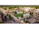 Aerial view of a neighborhood retail district and surrounding green spaces offering a walkable community at 385 Rowes Cir, Alpharetta, GA 30009