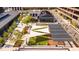 Aerial view of community with retail and restaurant spaces featuring inviting outdoor amenities at 385 Rowes Cir, Alpharetta, GA 30009