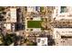 Overhead aerial shot of a lively town square with green space, surrounded by buildings and streets at 385 Rowes Cir, Alpharetta, GA 30009