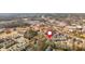 An aerial view highlighting the community's prime location near shopping centers and residential areas at 385 Rowes Cir, Alpharetta, GA 30009