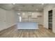 Kitchen island with granite countertops, pendant lighting, and ample storage at 4594 Eastbrook Pl, Snellville, GA 30039