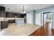 Modern kitchen with stainless steel appliances, a center island, and a great flow to living areas at 1761 Brandemere Dr, Austell, GA 30168