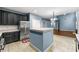 Open kitchen design with stainless appliances, generous cabinet space, and seamless living area access at 1761 Brandemere Dr, Austell, GA 30168