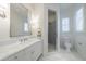 Elegant bathroom with marble countertops, glass shower, and modern fixtures at 479 Argonne Nw Dr, Atlanta, GA 30305