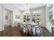 Elegant dining area with large windows and French doors to backyard at 479 Argonne Nw Dr, Atlanta, GA 30305