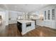 Well-appointed kitchen with a central island, stainless steel appliances, and custom cabinets at 479 Argonne Nw Dr, Atlanta, GA 30305