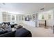 Bright room with a sectional sofa, shelving, and television that gives an open and welcoming ambiance at 479 Argonne Nw Dr, Atlanta, GA 30305