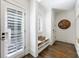 Mudroom featuring white shiplap walls, dark wood floors, and a built-in bench with storage at 479 Argonne Nw Dr, Atlanta, GA 30305