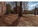 A wide grassy lawn area is featured outside of a townhome community at 401 Iona Abbey Se Ct # 6, Smyrna, GA 30082
