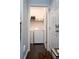 Laundry room with washer, dryer, and shelving for storage at 401 Iona Abbey Se Ct # 6, Smyrna, GA 30082
