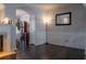 Living room featuring dark hardwood floors, fireplace and views into dining room at 401 Iona Abbey Se Ct # 6, Smyrna, GA 30082