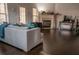 Comfortable living room with hardwood floors, fireplace, and a gray sofa at 401 Iona Abbey Se Ct # 6, Smyrna, GA 30082