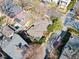 Aerial view of home with unique roof lines and mature landscaping, offering privacy at 289 9Th Ne St, Atlanta, GA 30309