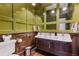 Stylish bathroom featuring green walls, a large sink, and unique design details at 289 9Th Ne St, Atlanta, GA 30309