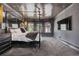 Modern bedroom with a four-poster bed, gray walls, dark hardwood flooring, and modern decor at 289 9Th Ne St, Atlanta, GA 30309