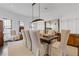 Formal dining room with large windows and seating for eight is perfect for entertaining guests at 289 9Th Ne St, Atlanta, GA 30309