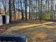 Large backyard with mature trees, shed, and fence; perfect for outdoor enjoyment at 2976 Nelson Dr, Duluth, GA 30096