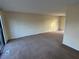 Spacious living room with wall-to-wall carpeting and a sliding glass door at 2976 Nelson Dr, Duluth, GA 30096