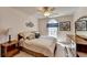 Cozy bedroom with natural light, ceiling fan, and ample storage offers a relaxing retreat at 4260 River Club Dr, Cumming, GA 30041