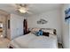 Comfortable bedroom with ceiling fan, wall decor, and bright window offers a peaceful rest at 4260 River Club Dr, Cumming, GA 30041
