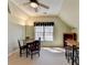 Bright bonus room with neutral walls, carpet, table, and ceiling fan at 4260 River Club Dr, Cumming, GA 30041