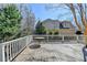 Relax on the expansive deck, perfect for entertaining and enjoying the outdoors at 4260 River Club Dr, Cumming, GA 30041