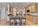 Bright kitchen with stainless steel appliances, granite countertops, and an island with barstool seating at 4260 River Club Dr, Cumming, GA 30041