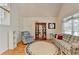Inviting living room features hardwood floors, vaulted ceilings, and large windows providing natural light at 4260 River Club Dr, Cumming, GA 30041