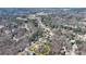 Aerial view of neighborhood in a circle, surrounded by trees at 4260 River Club Dr, Cumming, GA 30041