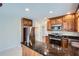 A clean kitchen showcases stainless steel appliances, granite countertops and a breakfast bar at 1975 Hunt Crossing Ct, Lawrenceville, GA 30043