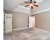 Spacious Primary bedroom with neutral walls, tray ceiling, carpet and closet at 1975 Hunt Crossing Ct, Lawrenceville, GA 30043