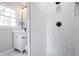 Bathroom featuring a glass shower with white tile and a white vanity at 2175 Venesa Cir, Austell, GA 30168