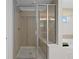 Shower featuring a modern glass enclosure and a tiled surround at 3387 Wild Clary Court Lot 20, Buford, GA 30519