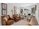 This home office features dual desks with shelving, comfortable seating, and ample natural light at 3387 Wild Clary Court Lot 20, Buford, GA 30519