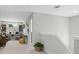 Loft area designed as home office and flex space, featuring carpet and neutral-painted walls at 3387 Wild Clary Court Lot 20, Buford, GA 30519