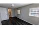 Bright bedroom with hardwood floors and adjacent bathroom, perfect for relaxation at 4214 Canby Ln, Decatur, GA 30035