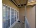 Cozy balcony with wooden flooring, ample natural light, and a charming view at 708 Mill Pond Se Dr, Smyrna, GA 30082