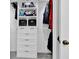 Organized closet features shelving, drawers, and hanging rods for efficient storage and organization at 708 Mill Pond Se Dr, Smyrna, GA 30082